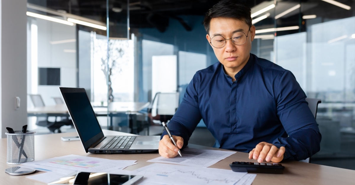 asian accountant working at office