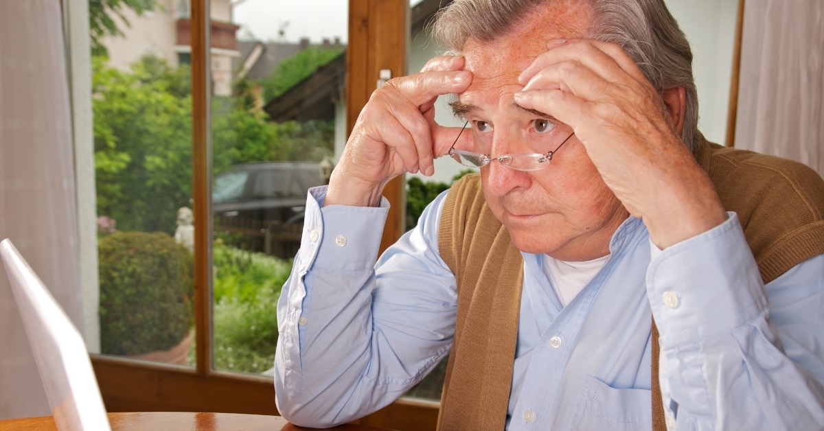 senior man focused on laptop