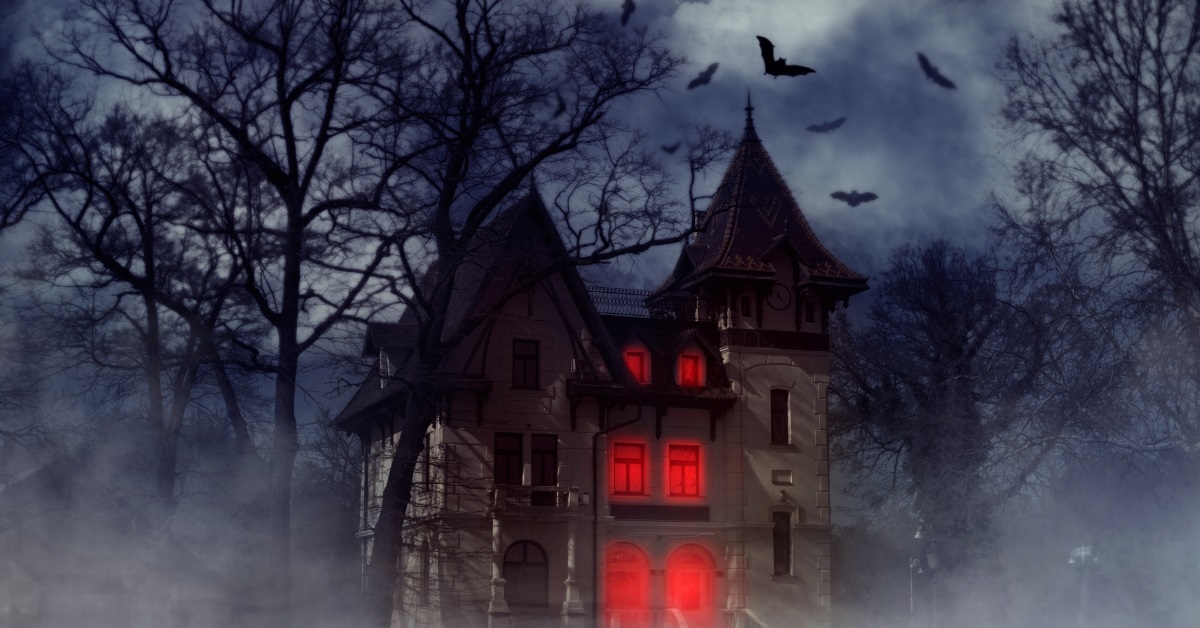 halloween house with trees and bats