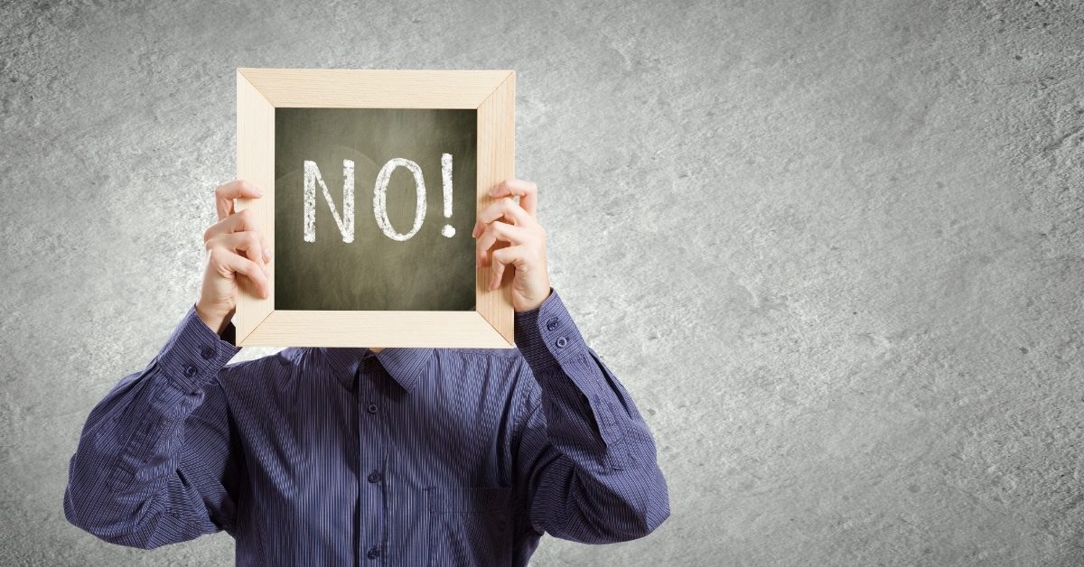 man holding no frame over face