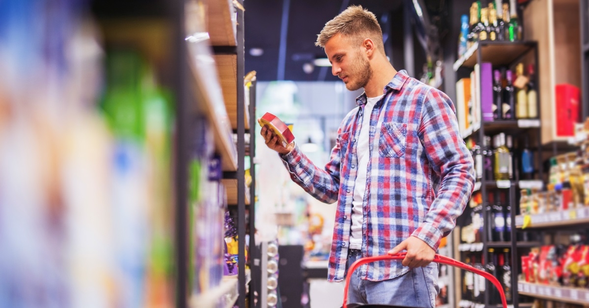 man shopping at grocery store