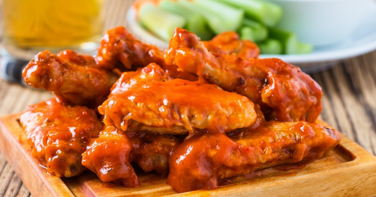 chicken wings covered in buffalo sauce