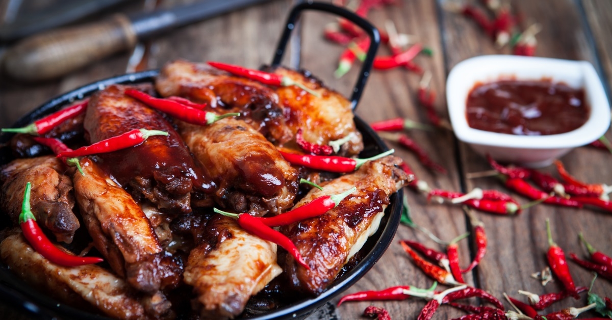 red chillies on buffalo chicken wings