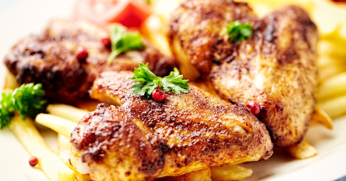 spicy chicken wings with french fries