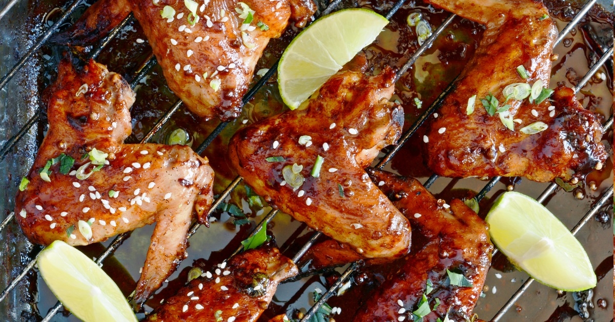 marinated buffalo wings on metal skewers