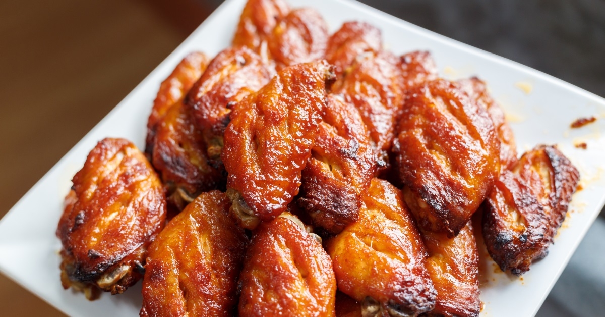 plate of bbq chicken wings