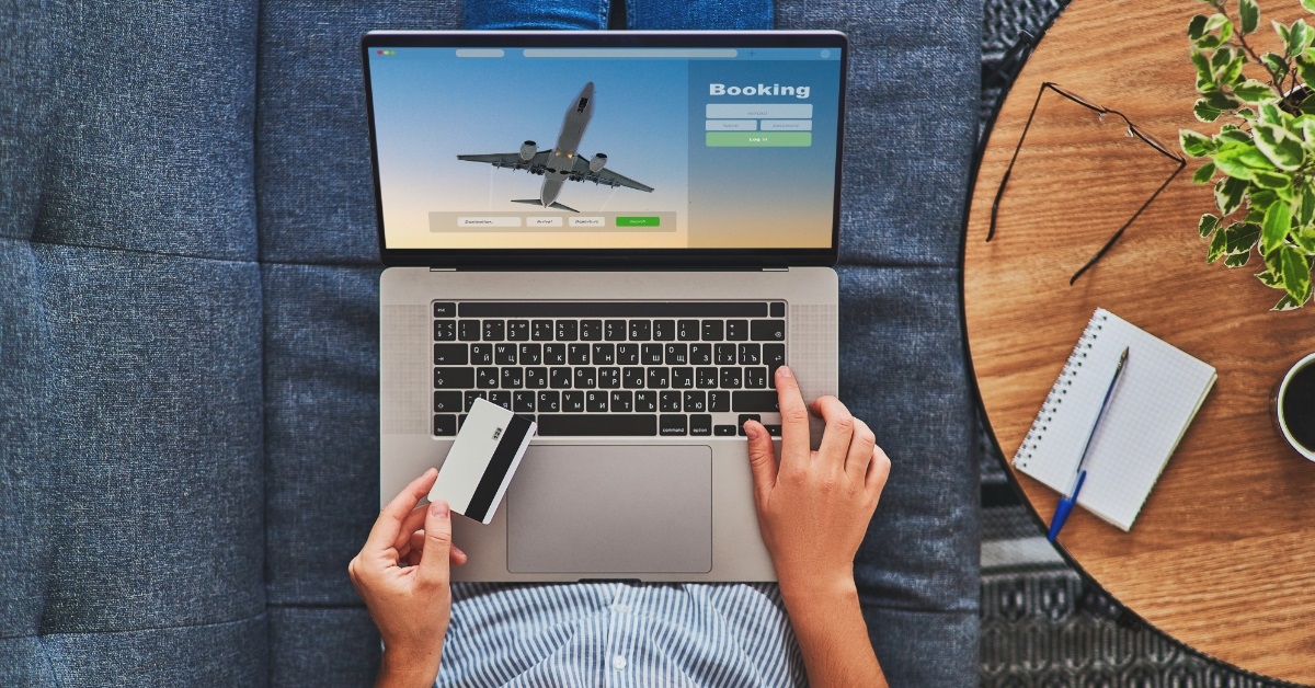 man using card for booking flight