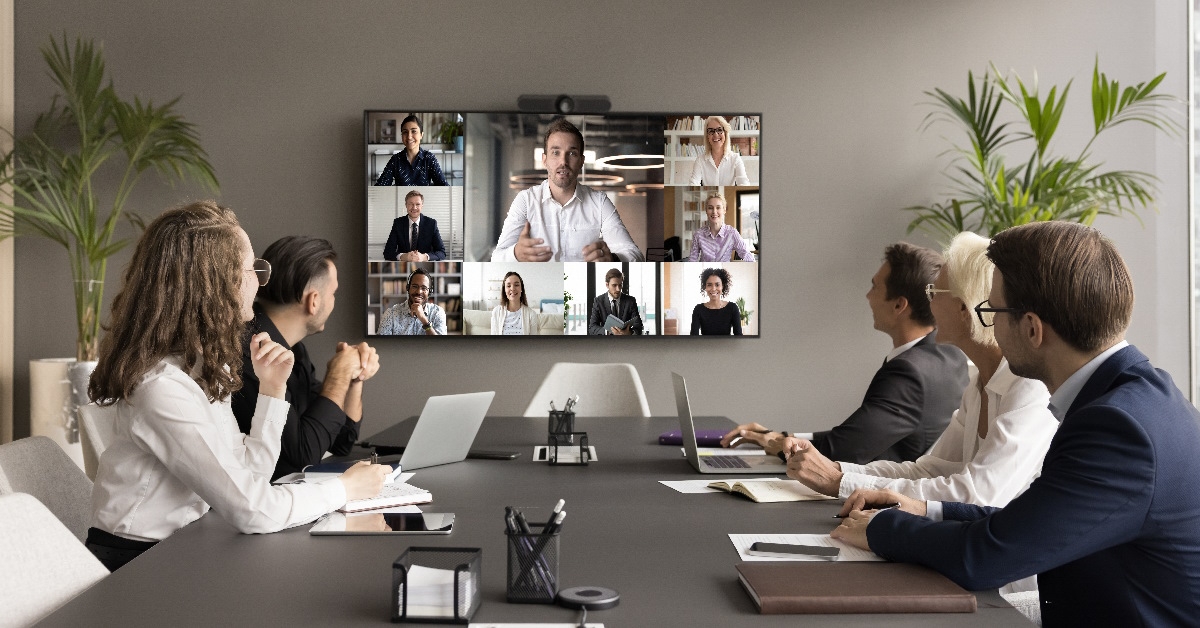 Employees and freelance workers in business meeting.