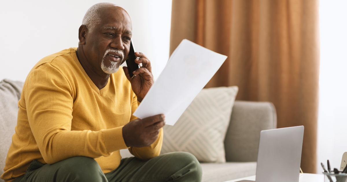senior black businessman talking