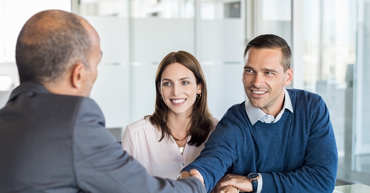 couple meeting with financial advisor