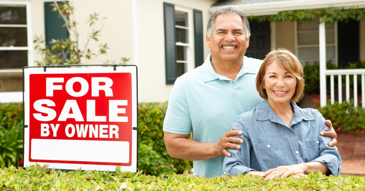 senior hispanic couple selling house