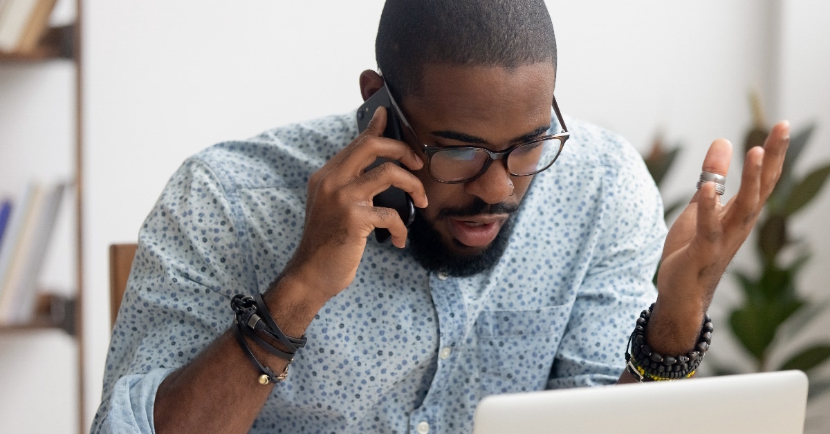 african american businessman angry on phone