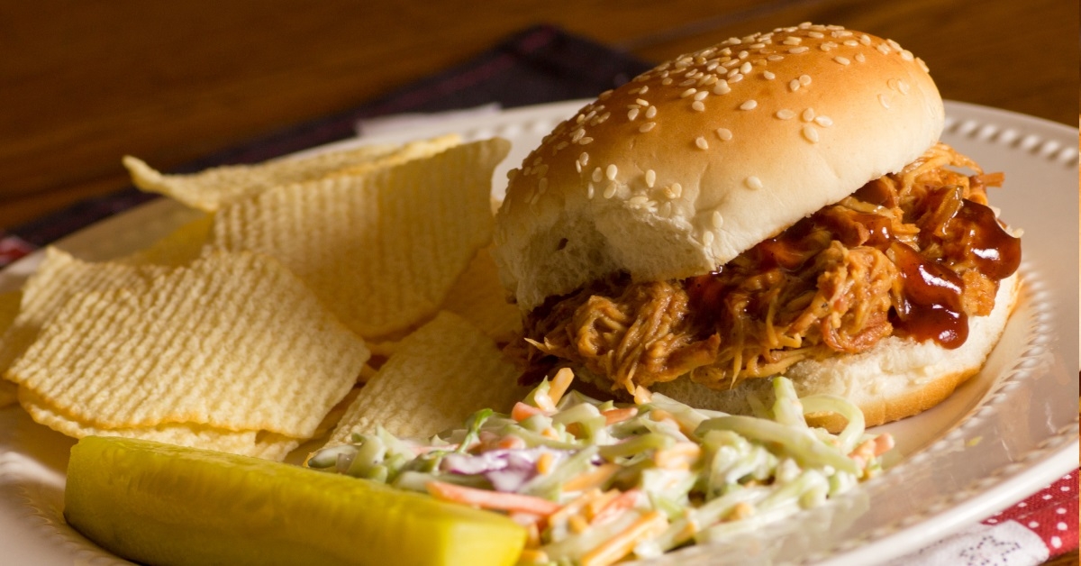 pulled pork sandwich coleslaw and pickle