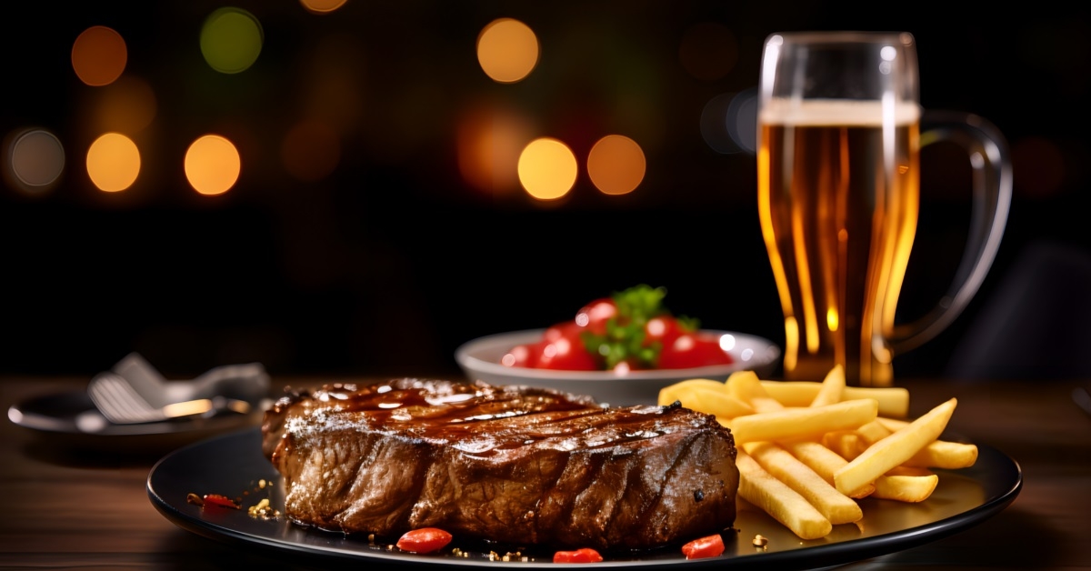 steak with french fries and drink