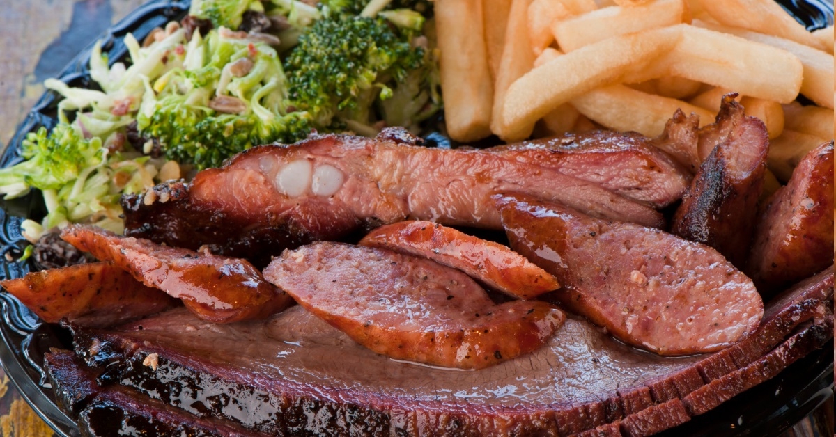 pork sausages with broccoli and fries