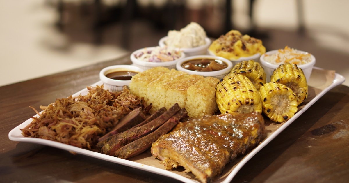 smoked brisket and ribs with corn