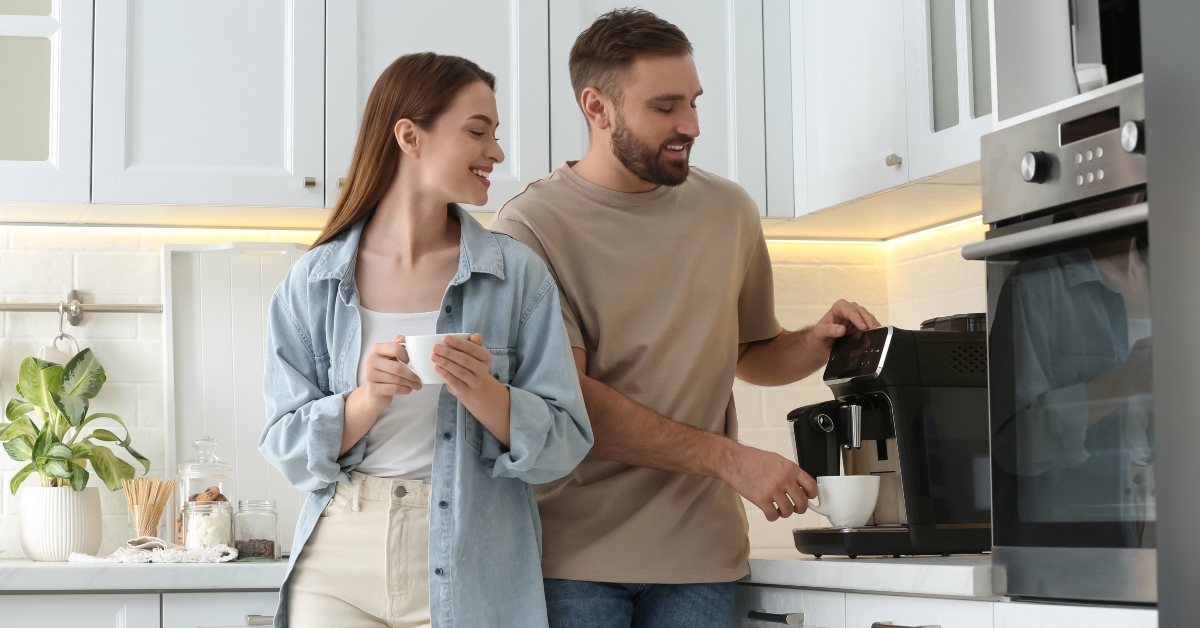 couple preparing fresh aromatic coffee