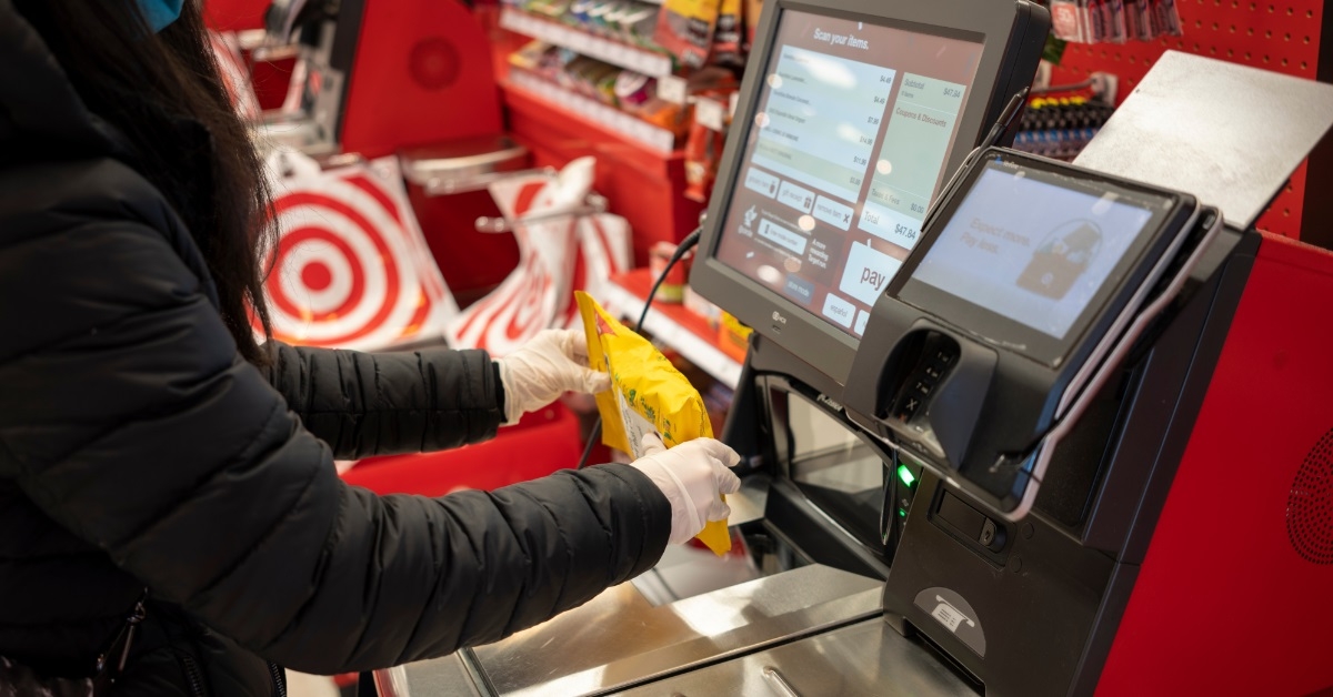 woman at target self checkout counter