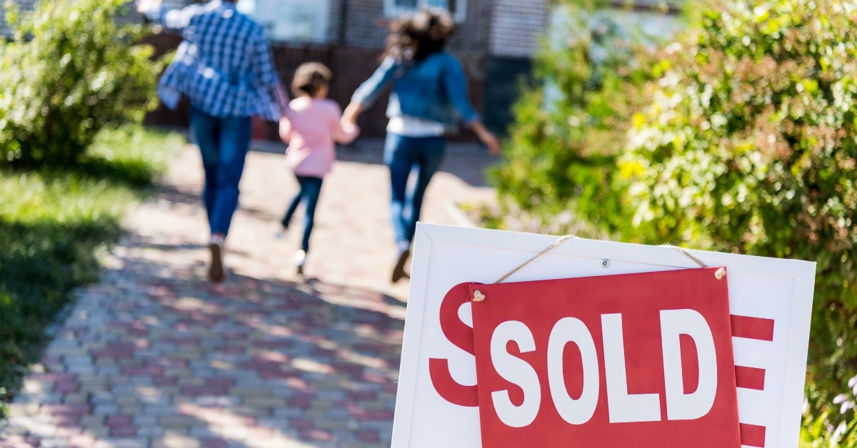 family running to new house