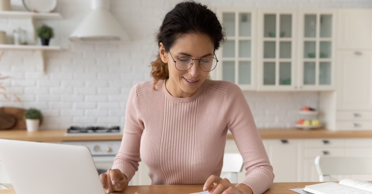 sit at table in kitchen