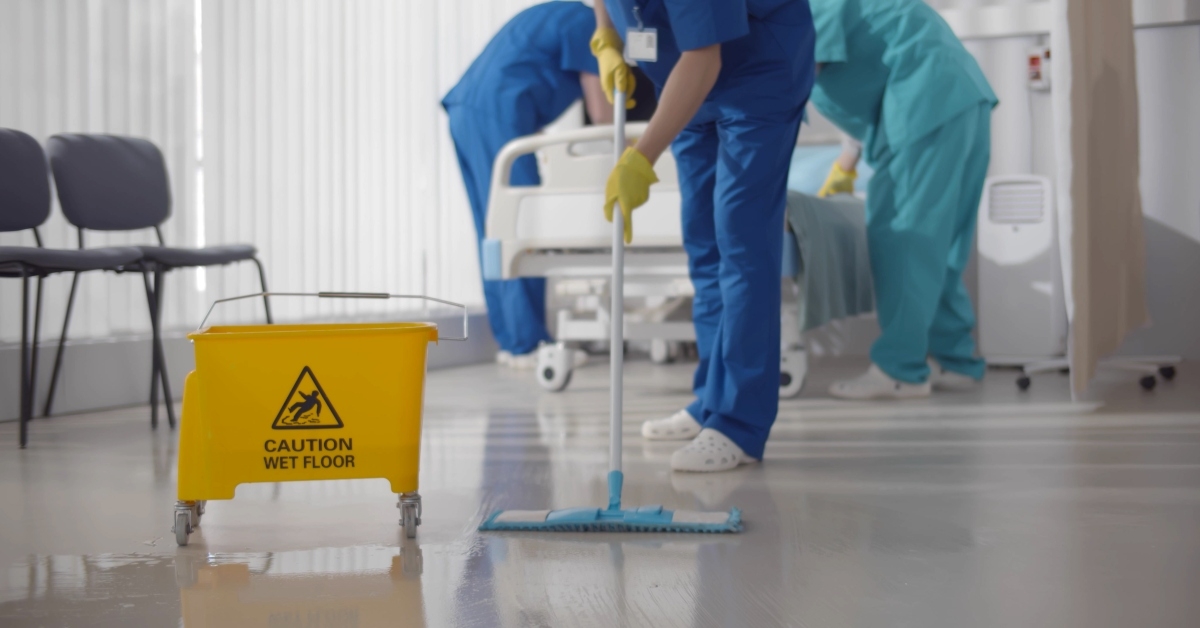 nurse mopping floor