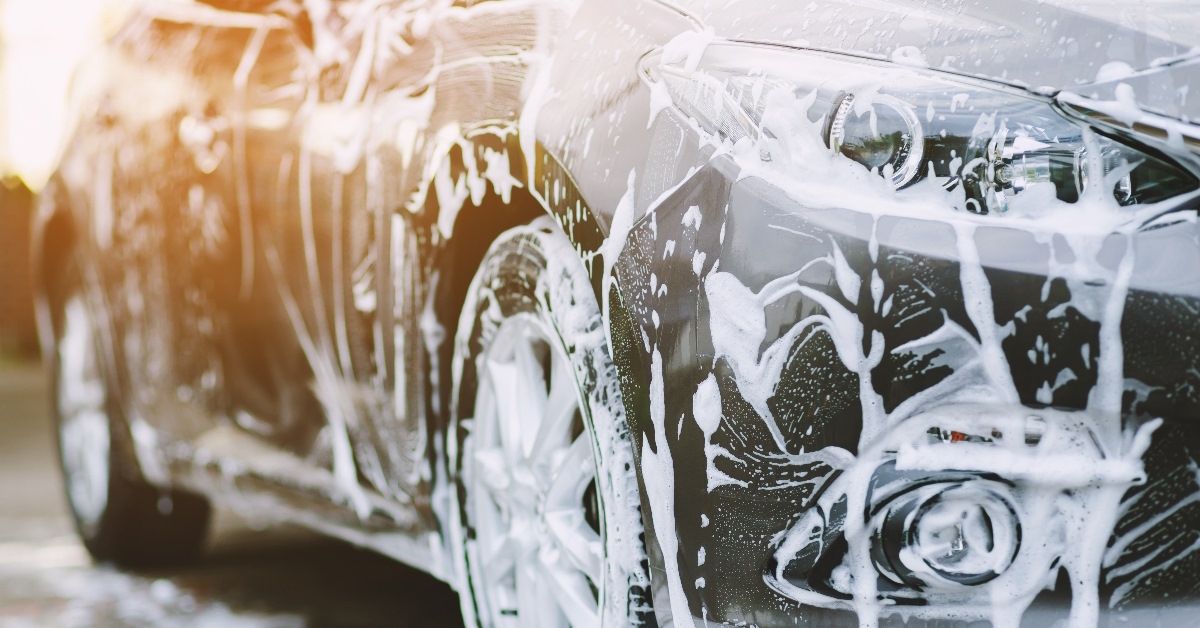 car with foam at car wash