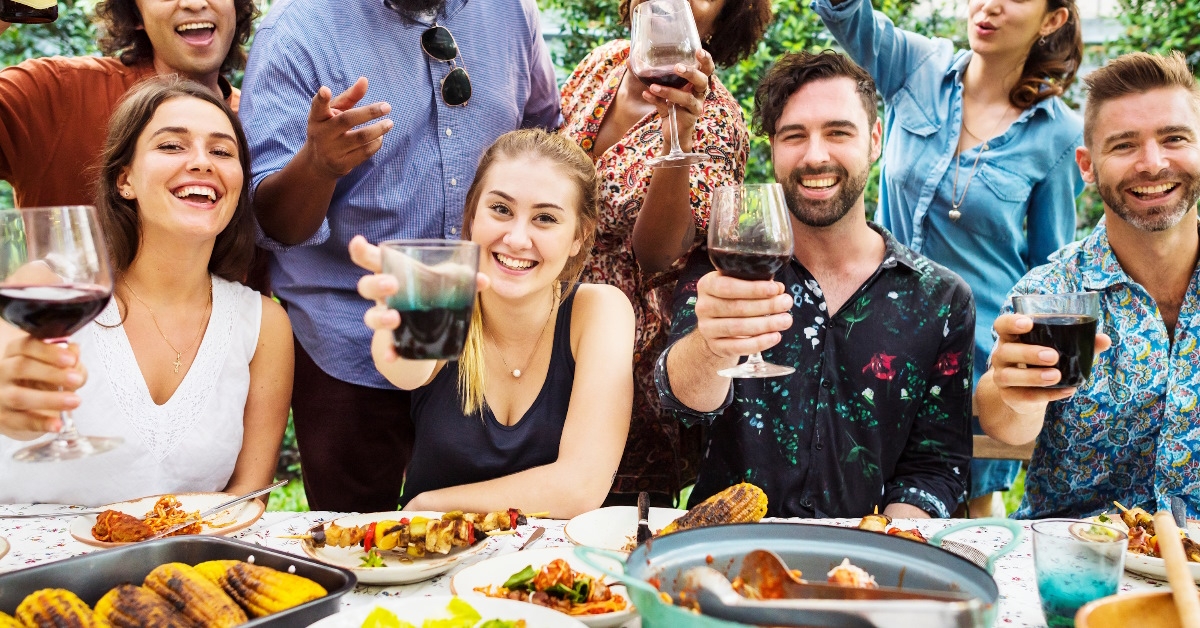 multi ethnic friends enjoying party together