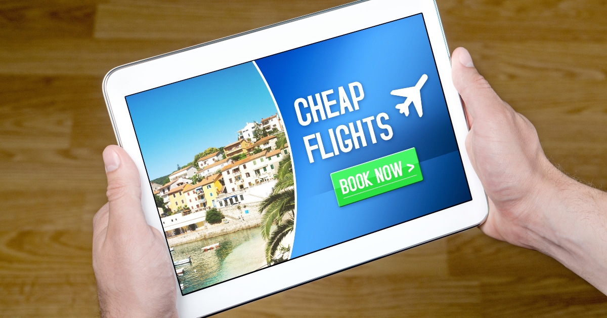 hands holding tablet with cheap flights