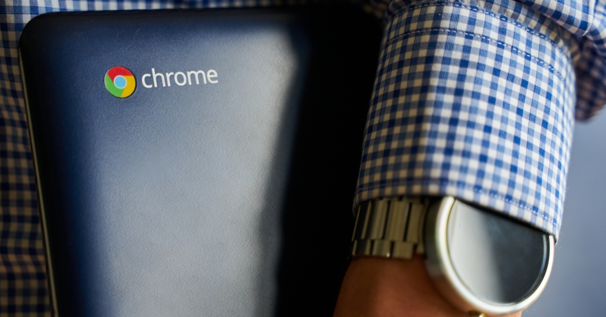 asus Chromebook in hand