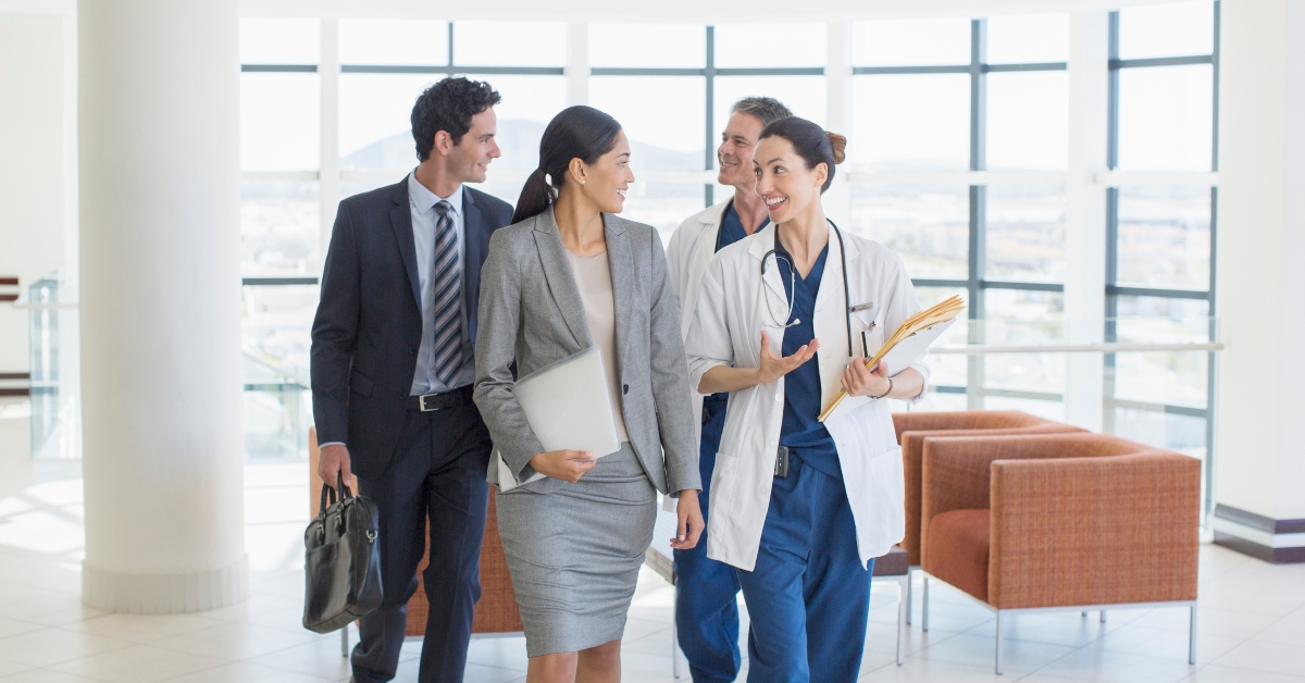 doctors and business people talking