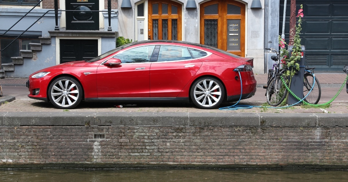 tesla car charging at public station