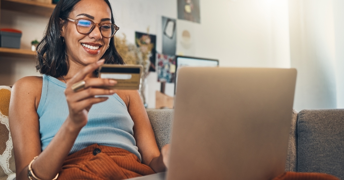 woman on couch with laptop