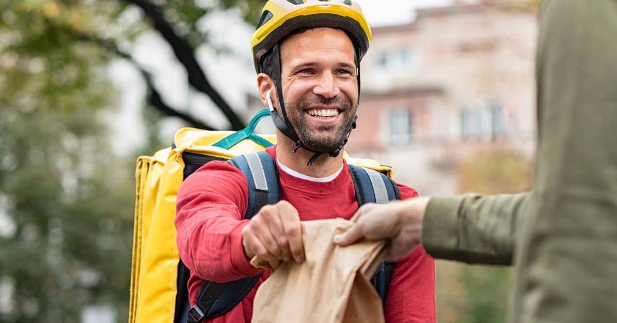 delivery man delivering takeaway food