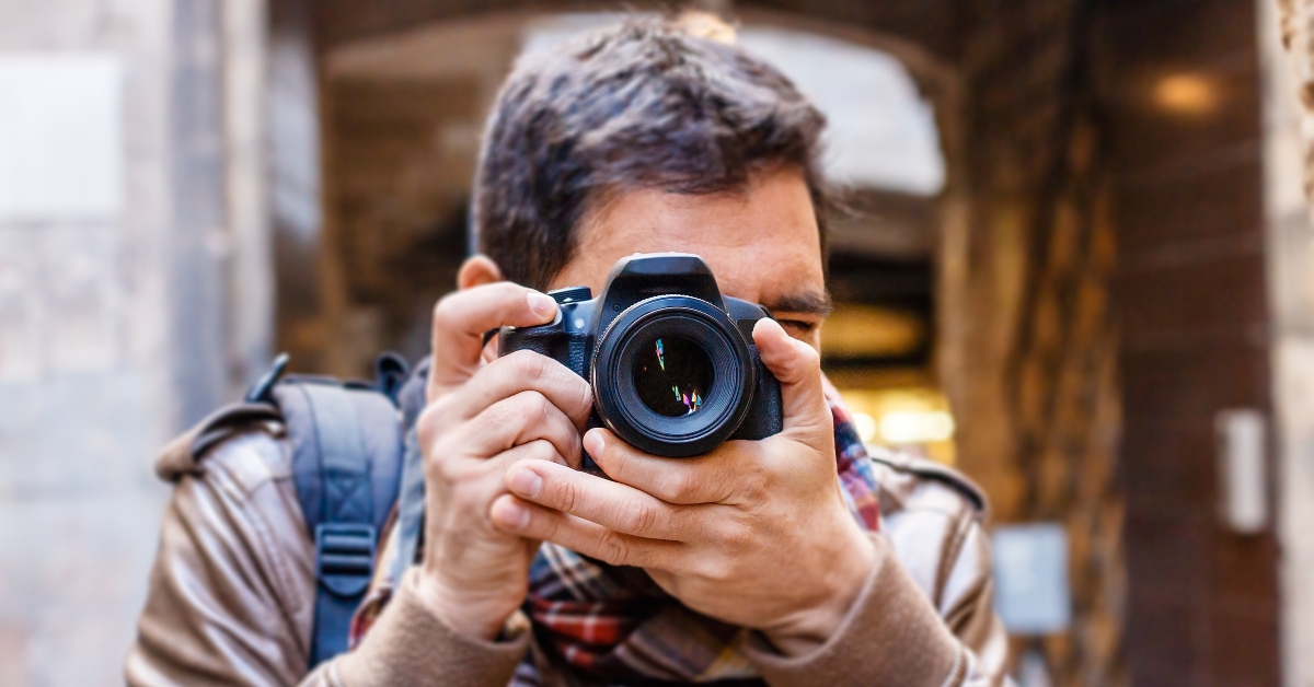 man taking a photo