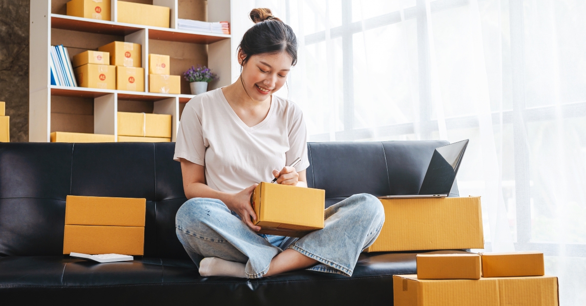 woman prepares to pack the boxes