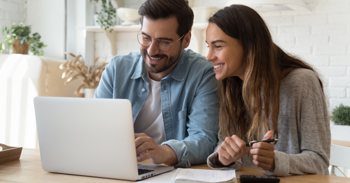 couple paying bills online