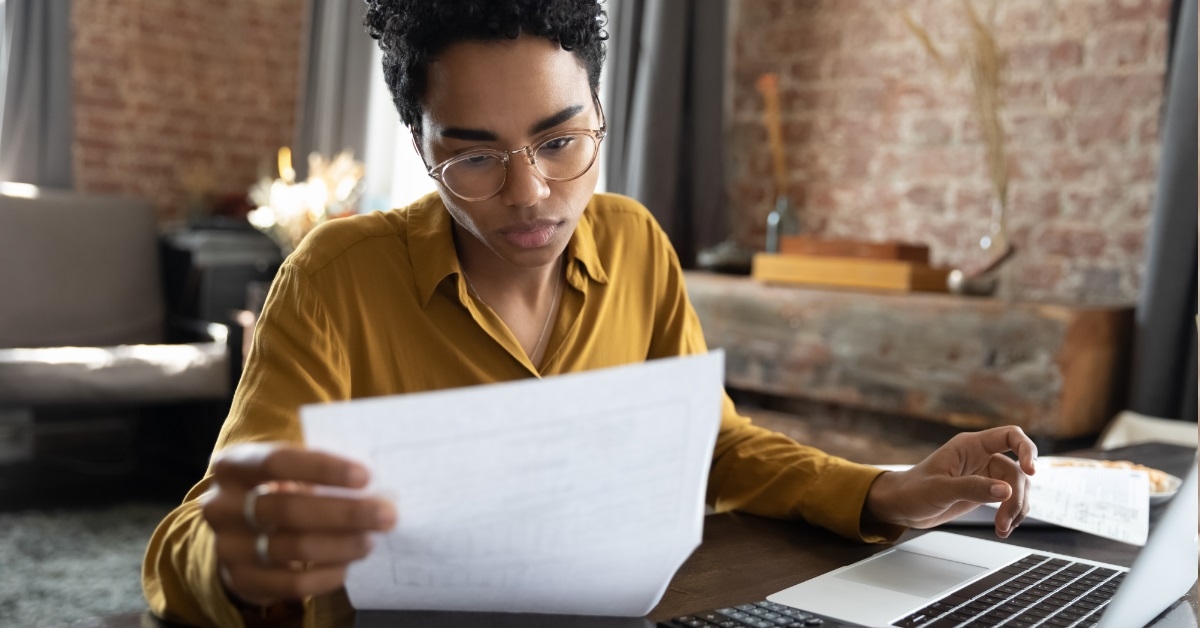 african american woman reviewing documents
