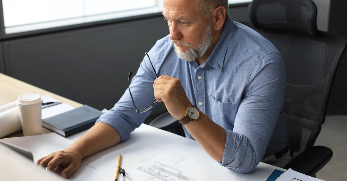 senior businessman working on laptop