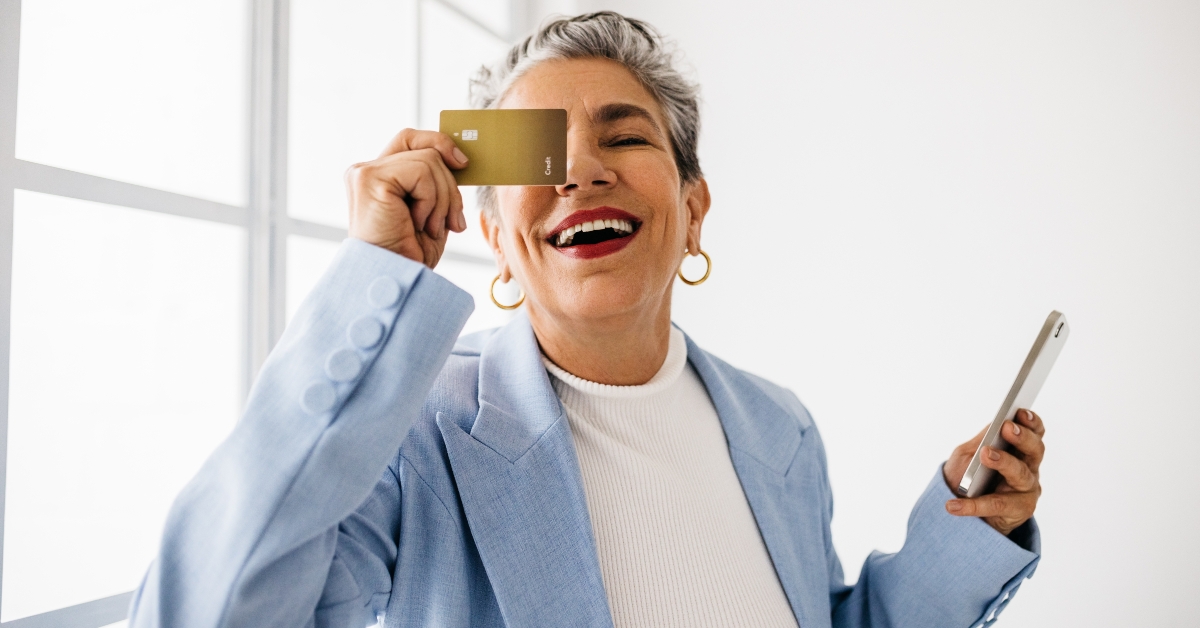 woman holding a credit card