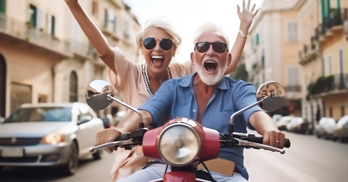senior couple enjoying scooter ride