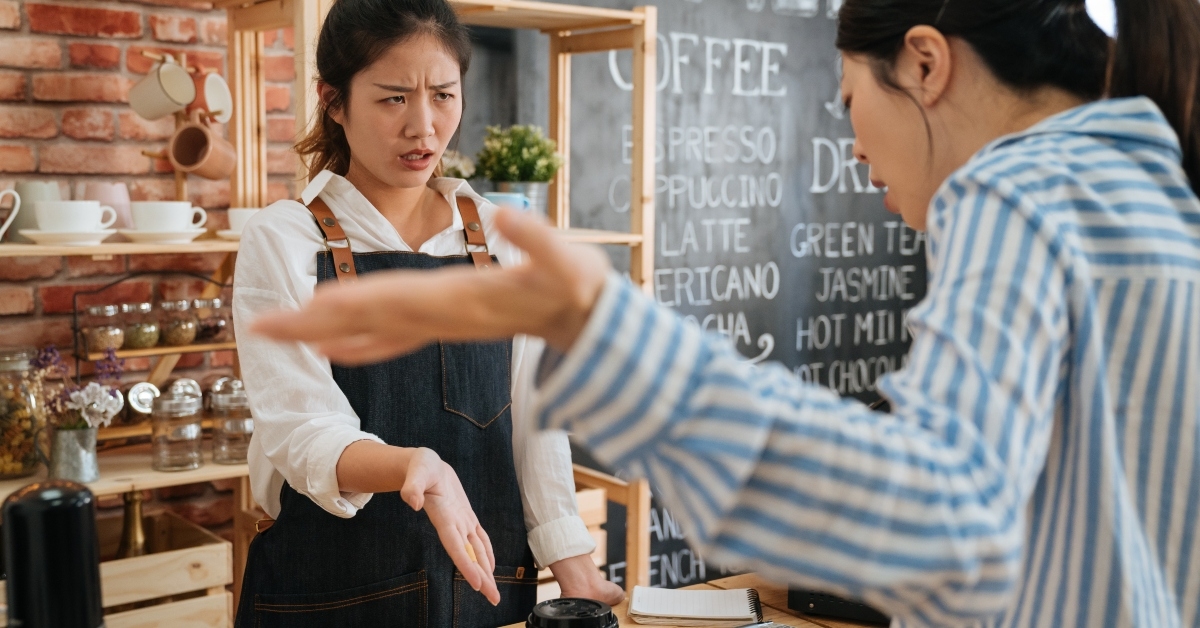 customer arguing with staff girl