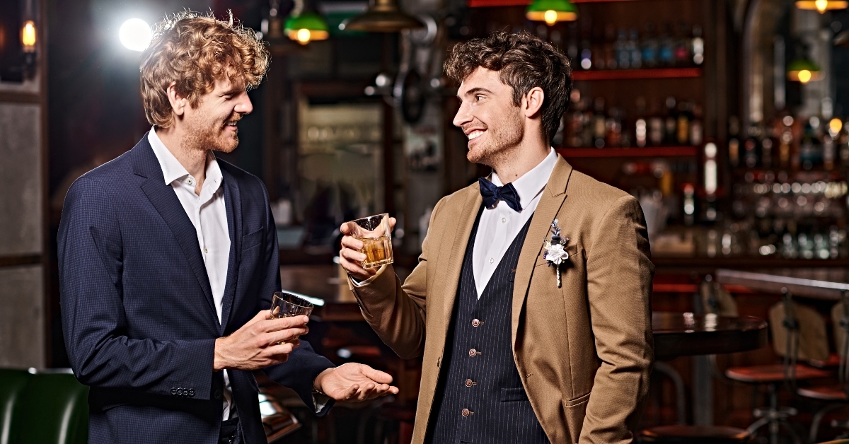 groom in suit with boutonniere