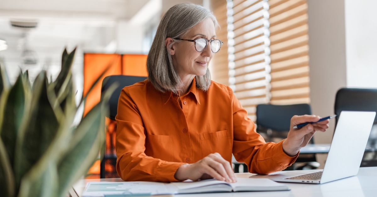 senior business woman working on laptop