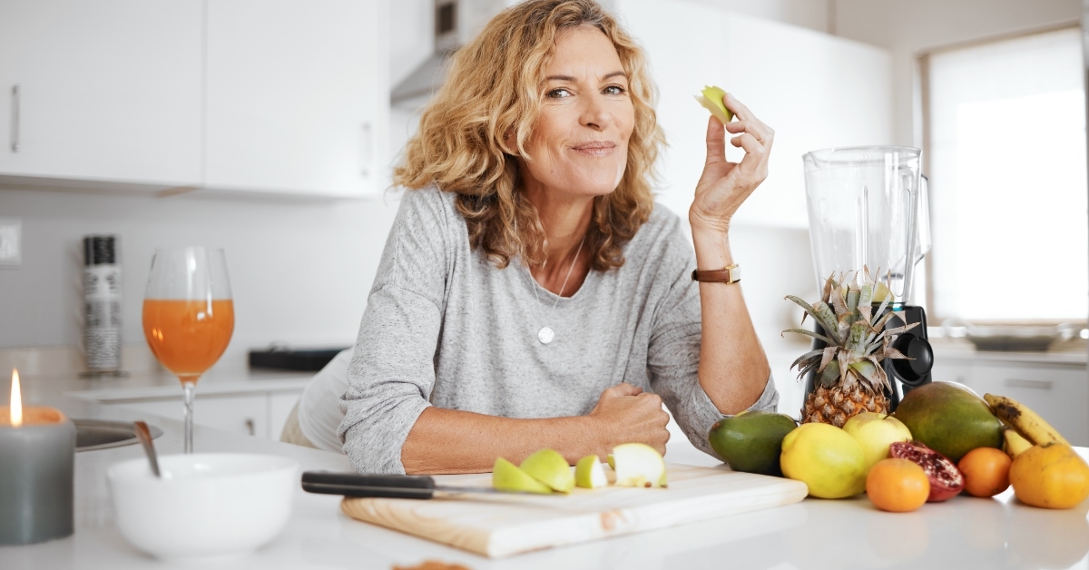 apple with a senior woman