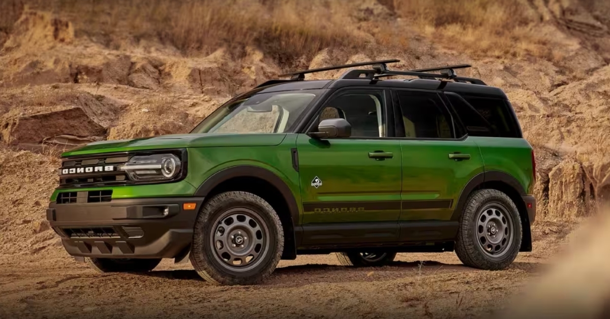 green ford bronco sport on hill