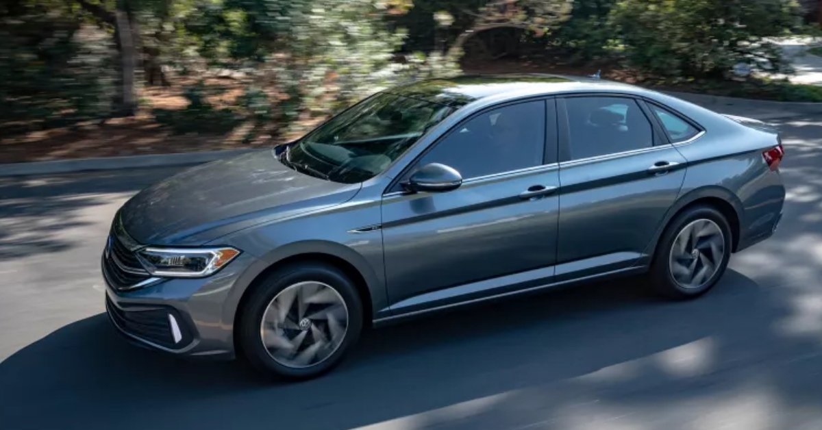 volkswagen jetta driving on road