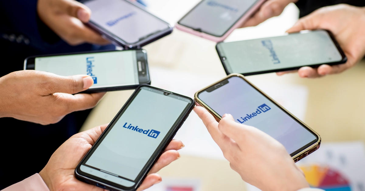 phones with logos of LinkedIn