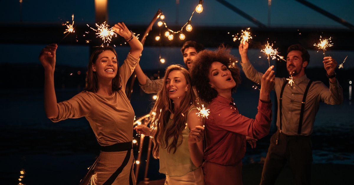 friends celebrating with fireworks