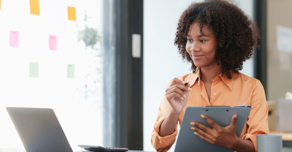 black woman working on laptop