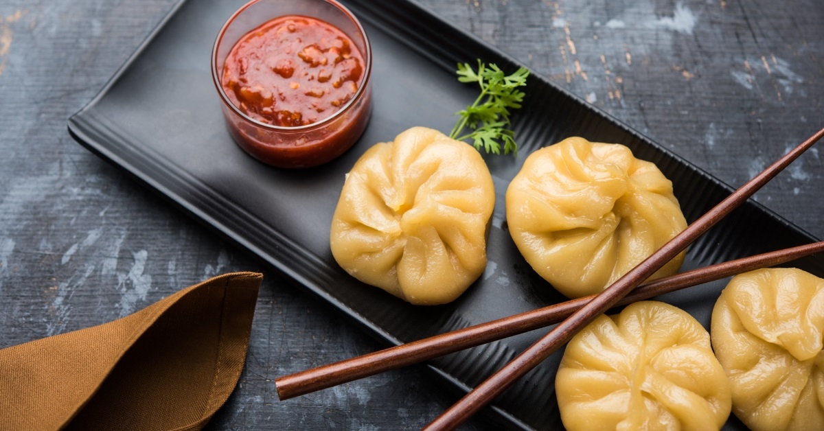 delicious nepalese momos with tomato chutney
